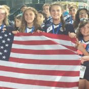 International Soccer Tours: Young female players holding US flag